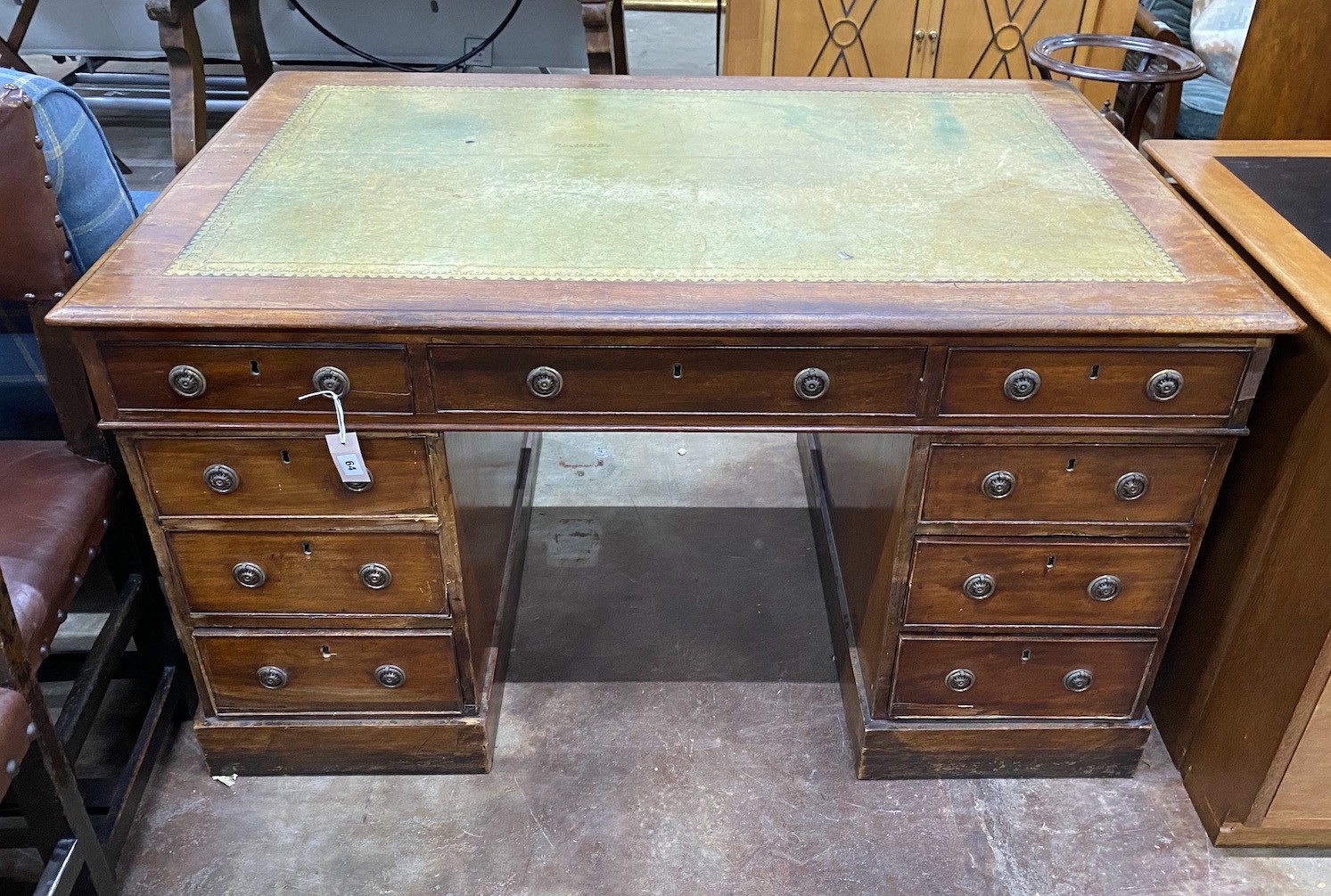 A small Victorian mahogany pedestal partner's desk, length 137cm, depth 90cm, height 76cm